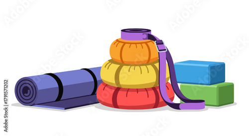 Colorful yoga gear including blocks and straps on a white background