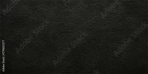 Dark black leather texture surface with a rough pattern and background structure