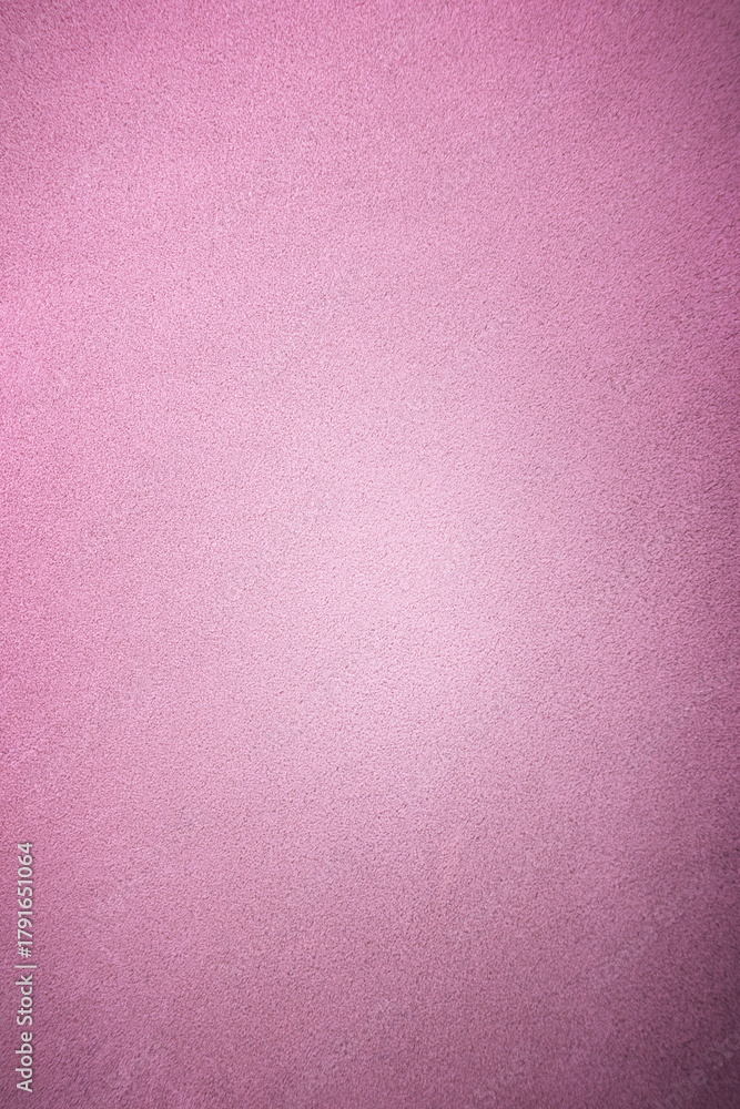 Fototapeta premium Pink suede background with light center. Natural suede leather pink.
