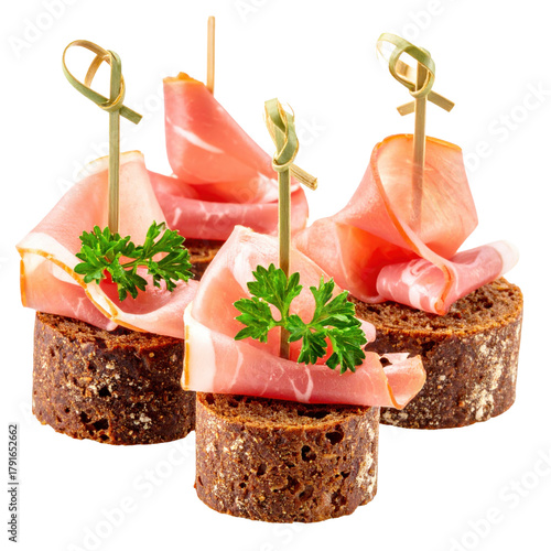 Simple rye canapés with ham, an easy and delicious party appetizer or snack, perfectly isolated on white background for a minimalist food concept