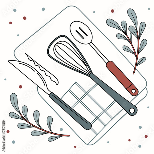Assorted kitchen utensils on a dishcloth