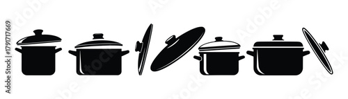 Collection of cooking pots and pans. Kitchen utensils for food preparation.
