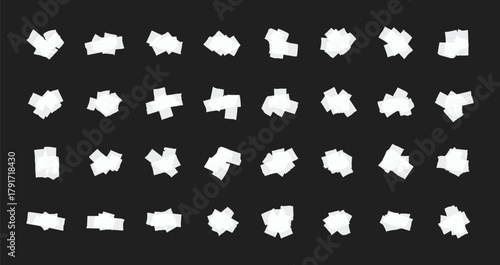 Collection of various scattered white masking tape pieces, perfect for creating collages.