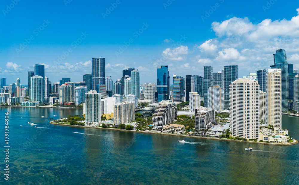 Obraz premium Aerial view of Brickell skyscrapers. Modern cityscape of downtown Miami. Panoramic Miamis skyline above the coastline. Brickell Key aerial view in Miami. Landscape of Miami. Miami Beach and Brickell.