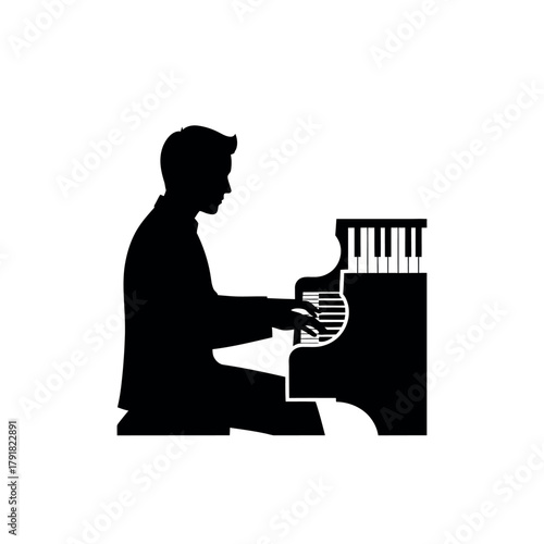 Silhouette of a man playing the piano.