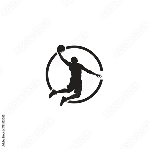 Dynamic Silhouette of a Basketball Player in Mid Air Executing a Jump Shot Action