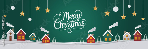 Green Merry Christmas and Happy New Year Greeting Card – Paper Art Style Winter Landscape with Snowy Forest, Red Village Houses, and Festive Holiday Celebration Background