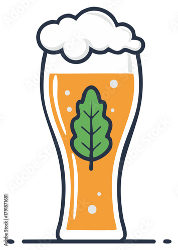 Glass of refreshing golden beer with frothy head and green hop leaf inside