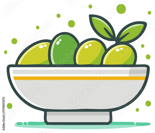 Fresh green olives in a white bowl with leaves and scattered dots
