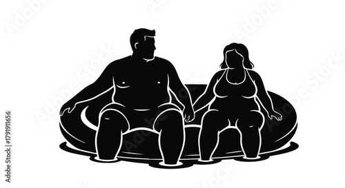 Couple holding hands while relaxing in a floating tube on water