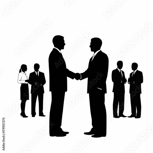 Silhouette of two businessmen shaking hands in agreement.