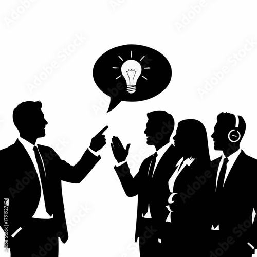 Silhouette of a business team discussing a new bright idea.