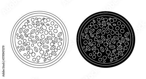 Two circular manhole covers one line art and one filled black