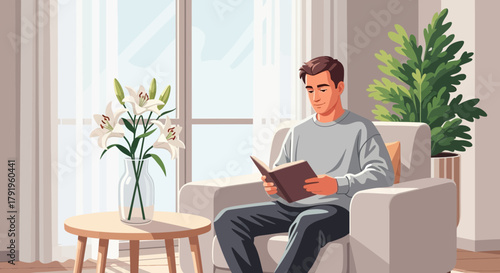 Serene indoor scene of a man engrossed in reading a book in his living room