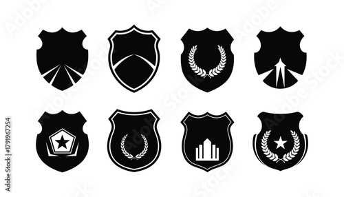 Collection of eight police and security badges with different emblem elements like laurel and star