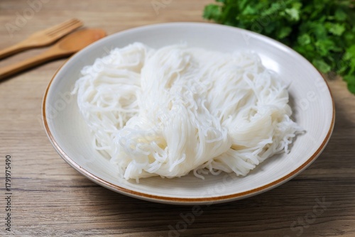 Photos Thai rice noodle in white ceramic plate,thai called Khanom Jeen