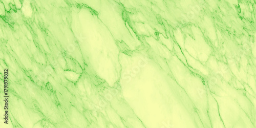 Vibrant lime green marble texture with natural veins and glossy finish for luxury background and interior design.