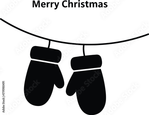 Merry Christmas mittens hanging on a string
