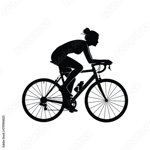 Female cyclist silhouette training on road bike sport