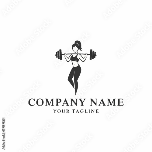 Strong woman lifting heavy barbell in a gym setting.