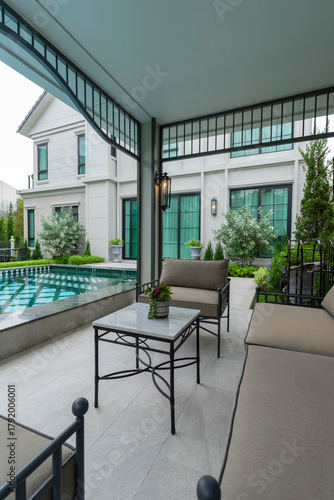 Backyard home patio and swimming pool for leisure lifestyle,