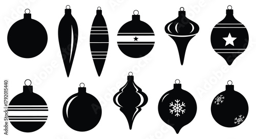 Collection of diverse black christmas ornaments with various shapes and decorative patterns on a white background