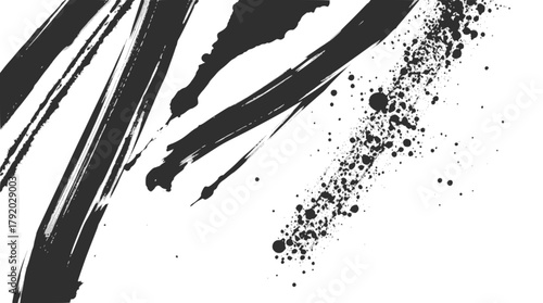 Abstract black ink brush strokes and splatters on