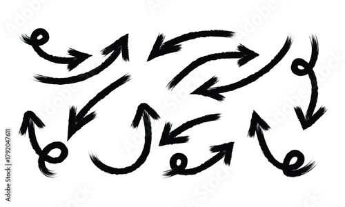 Collection of hand drawn black arrows pointing in various directions on white background