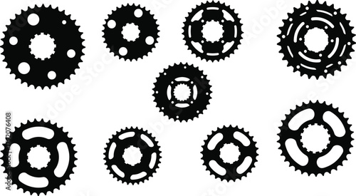 Bicycle chainring and sprocket silhouette set with varied gear designs, black vector illustration on white background for cycling, mechanical, and design themes