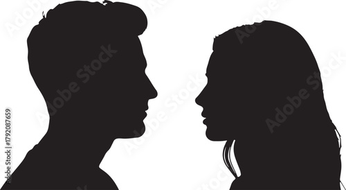 Silhouetted profiles of man and woman looking at each other