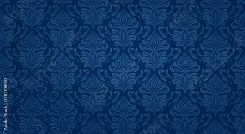 Elegant blue damask background with intricate floral patterns, ideal for luxury designs and vintage-themed projects, adding a touch of classic sophistication.