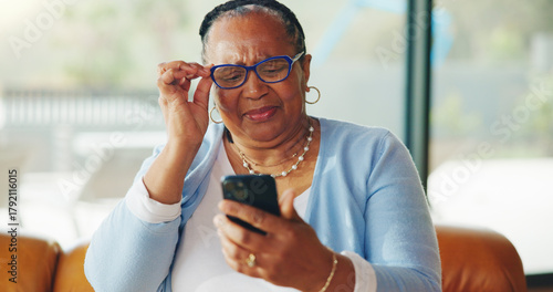 Fotografie Old woman, glasses and struggle with mobile reading, vision problem and small font size for difficulty