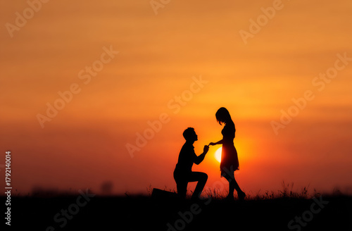 Wallpaper Mural Romantic proposal sunset silhouette couple love tender moment Torontodigital.ca