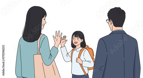 A mother and her daughter high-fiving while the father stands nearby, depicting a warm family moment.