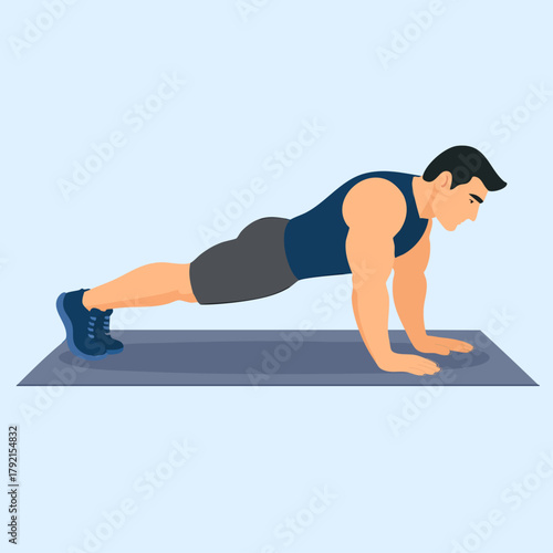 Man Performing Push Up On Exercise Mat In Gym
