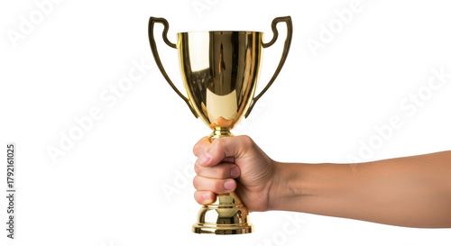 Hand holding a shiny golden trophy with two handles against a background isolated on a transparent background