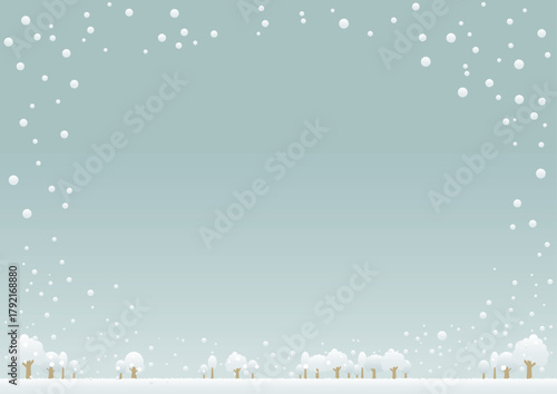 Gentle snowfall over a quiet winter village landscape