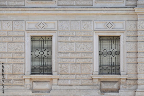Prefecture Building Facade Detail with Window Grills in Trieste, Italy