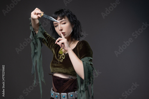 Fantasy forest elf heroine in flowing top with dagger belt, costumed portrait