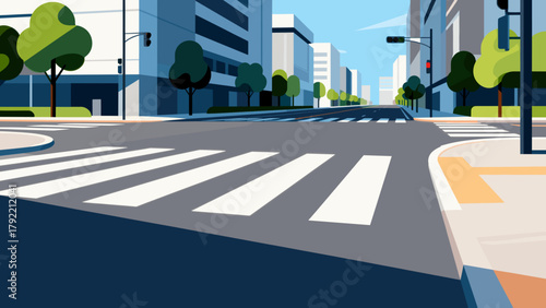 Urban street with crosswalk and modern buildings under clear sky  