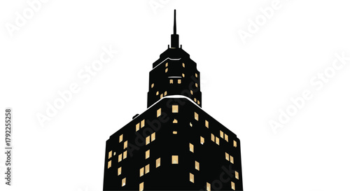 Modern skyscraper silhouette with glowing windows at night