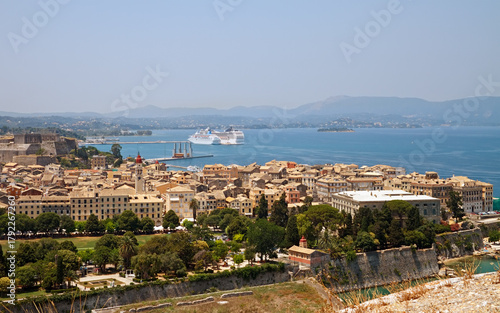Panoramic view of parts of old Corfu City and cruise ships in the port, Corfu Island, Greece.