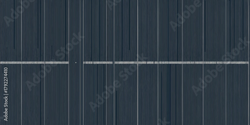 A detailed close up of a solar panel showing the grid lines and the dark blue silicon cells surface