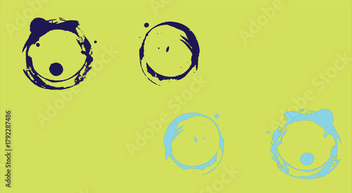 The image features a visually striking arrangement of five circular objects set against a bright yellow background, which enhances their visibility and creates a cheerful atmosphere.