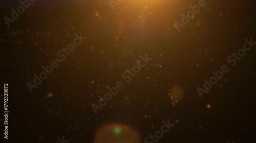 Floating dust particles in soft warm backlight