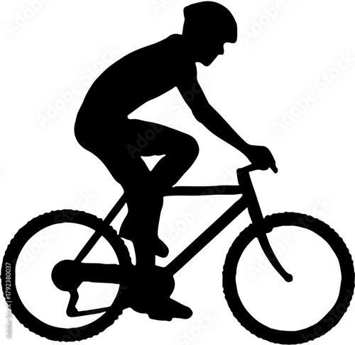 silhouette of a man riding a bicycle