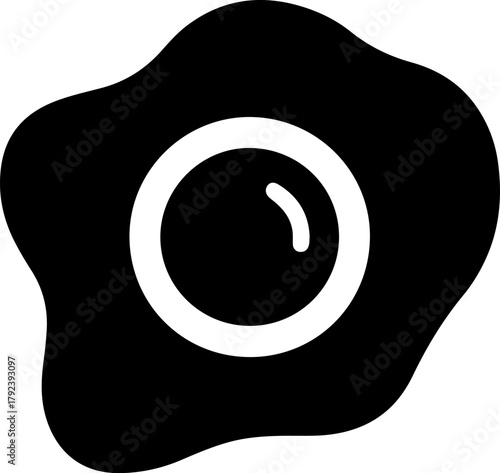 Black and white icon of a fried egg with a yolk