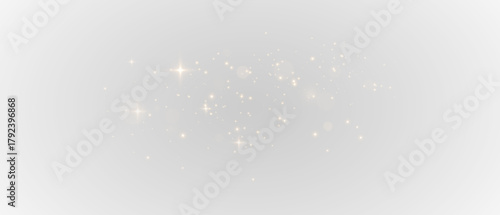 Golden light effect PNG file featuring shimmering glitter, sparkling stardust, golden confetti, and sparkling particles on a bright festive background. Abstract holiday illumination.
