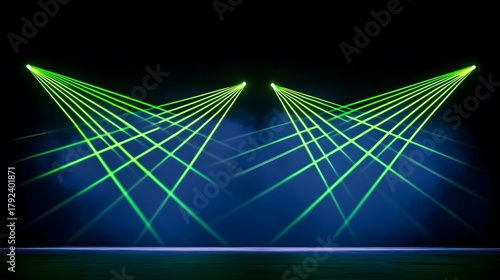 The image shows a stage with two sources emitting bright green laser beams that crisscross through the air, creating a dynamic display against a dark background, filled with atmosphere.