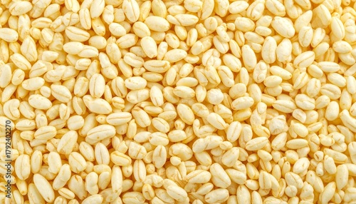 Close-up of puffed rice grains in light yellow tones